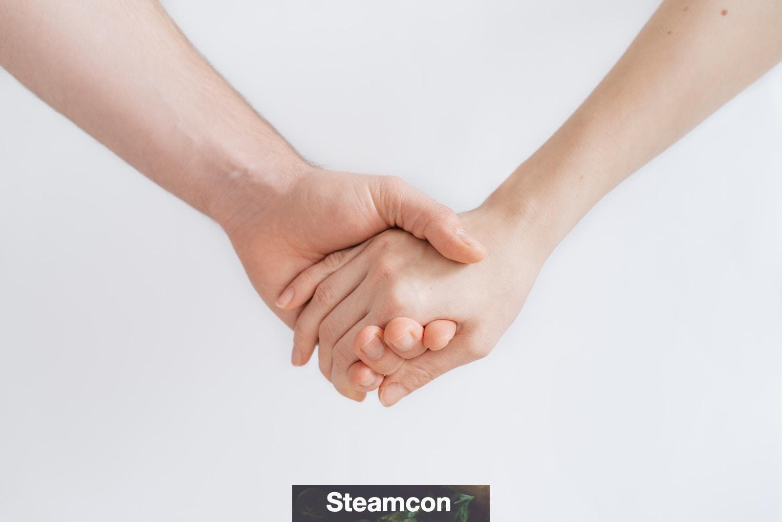 woman and man holding hands