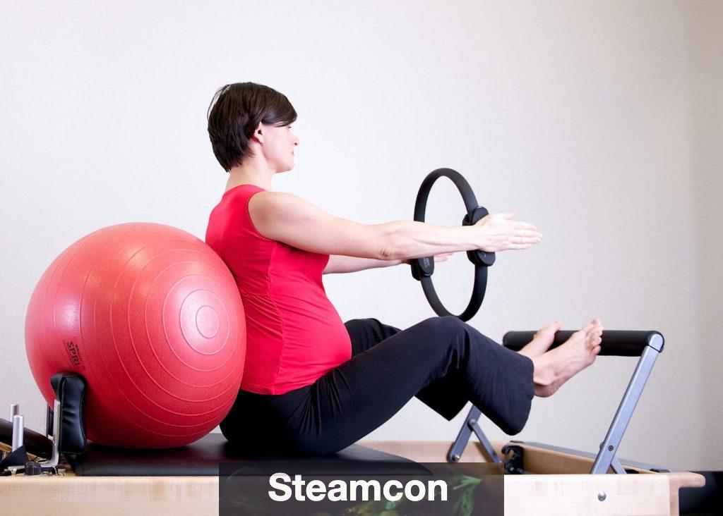 Woman in Red Shirt Sitting on Fitness Equipment