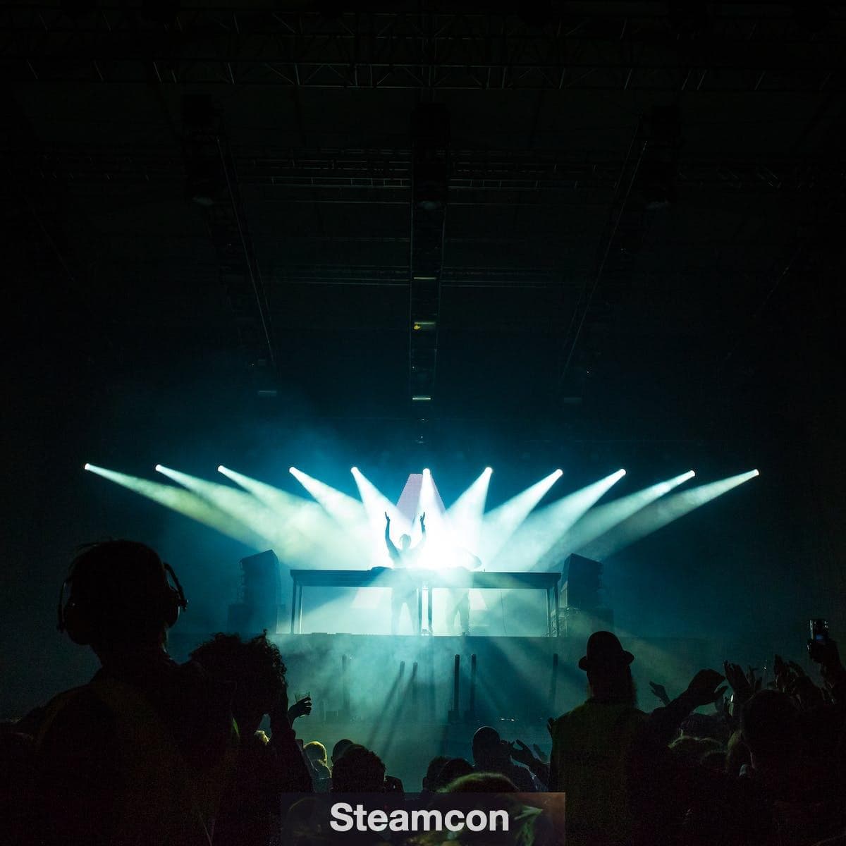 People Inside Dark Room With Spotlights
