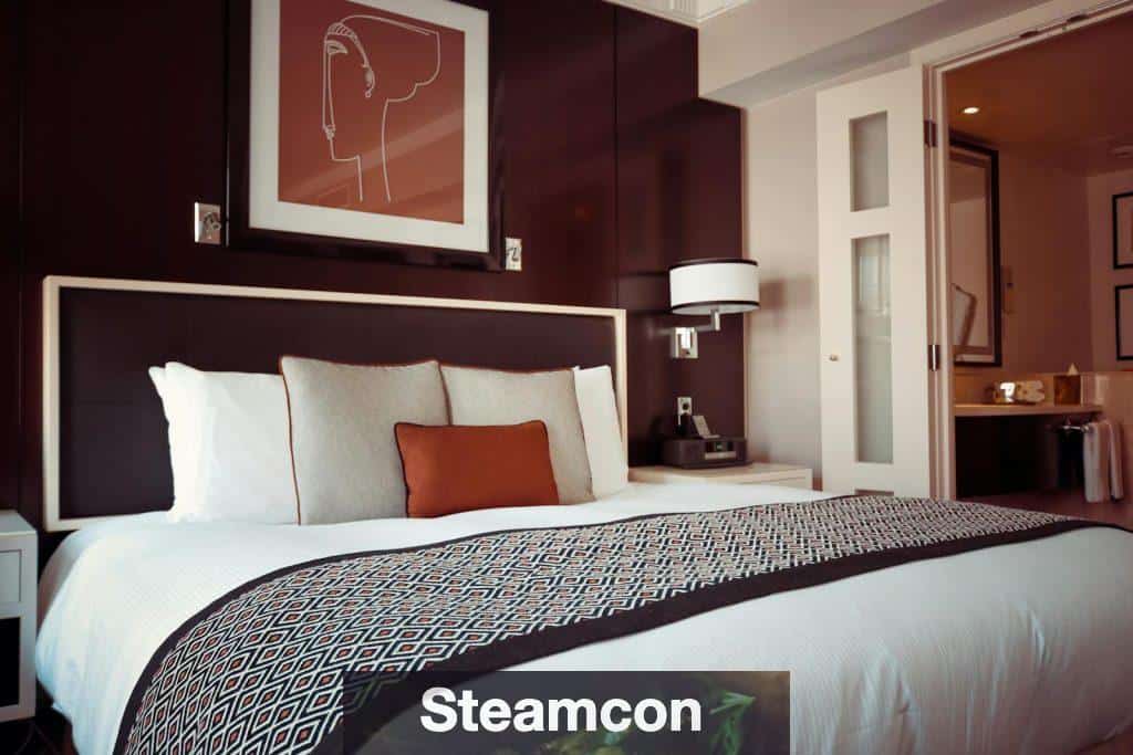 Black and Grey Bedspread on Bed and Pillow