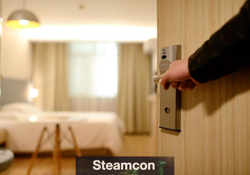 Person Holding on Door Lever Inside Room