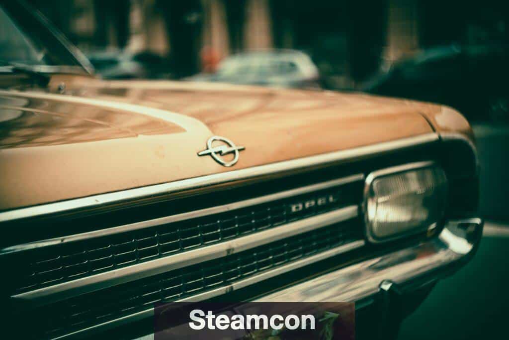 brown mercedes benz car in tilt shift lens