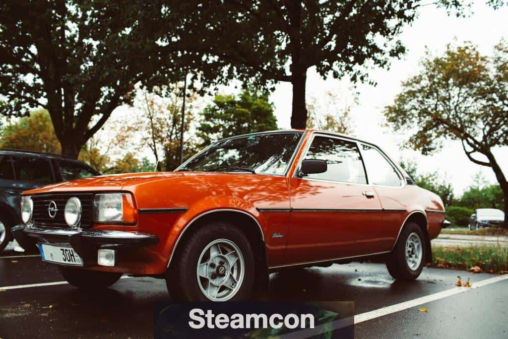 Orange Opel Ascona Car Parked under the Trees
