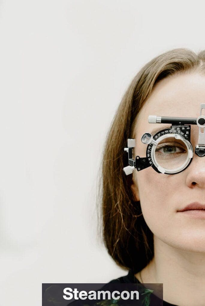 Close-up of woman wearing phoropter for vision test in a clinic setting.
