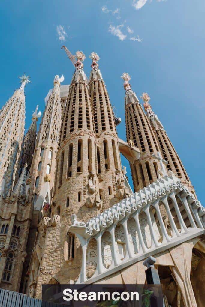 A very tall building with statues on it's sides