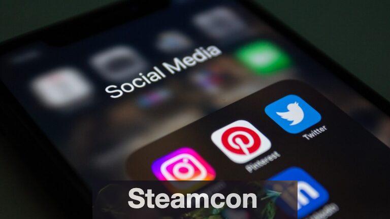 a close up of a cell phone with social media icons on it